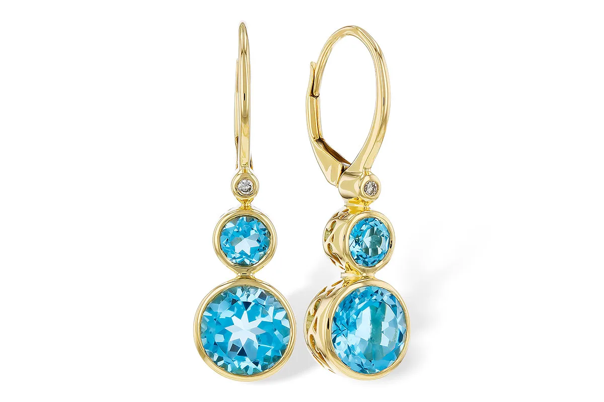 Blue Topaz Earrings in yellow gold
